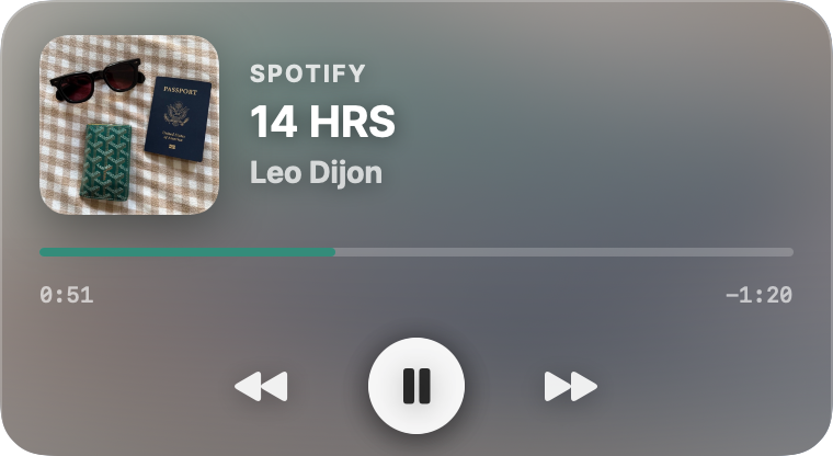 Halo widget — Spotify now-playing with an album-art mesh backdrop